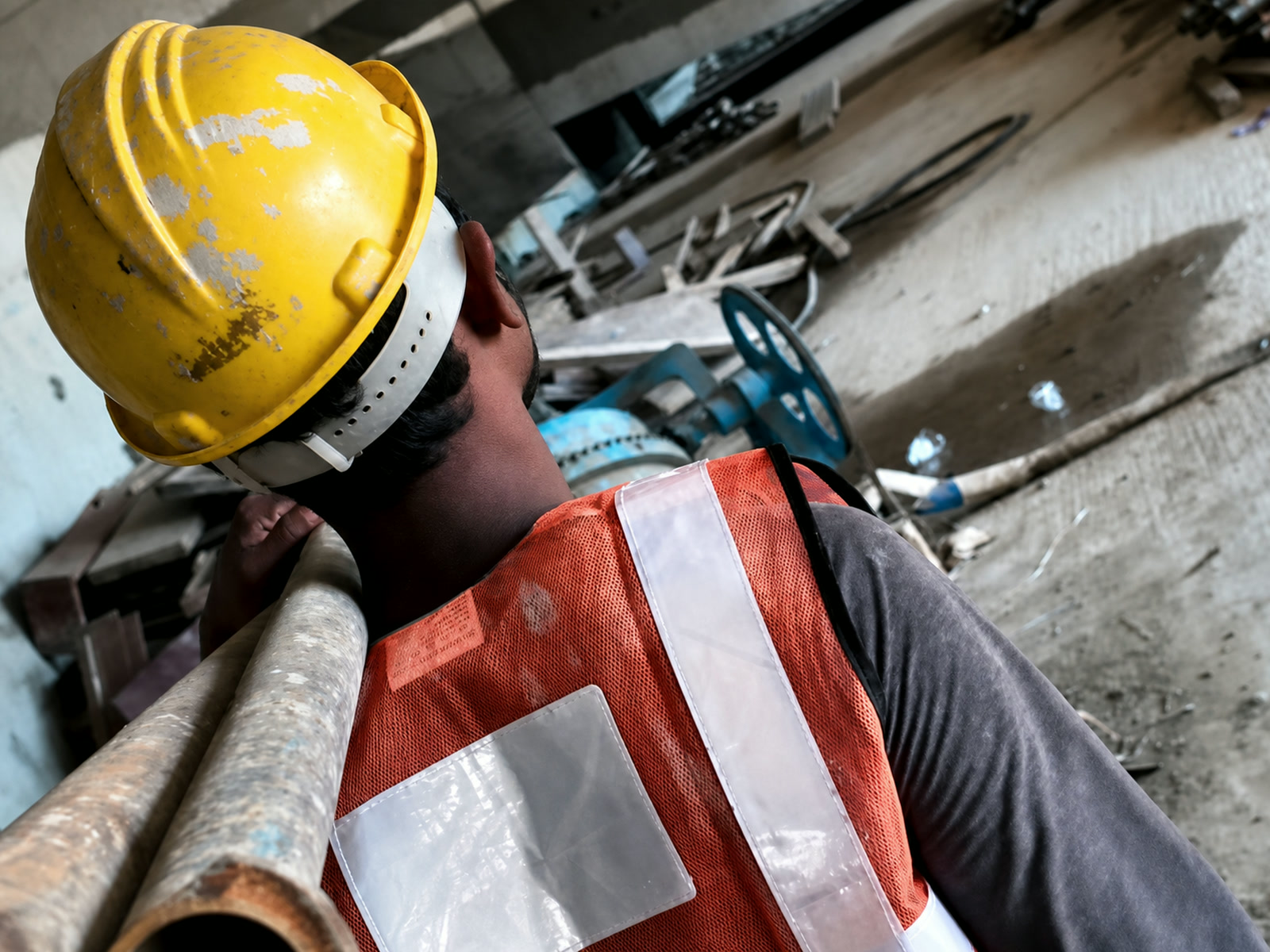 Civil construction professional working with structural materials